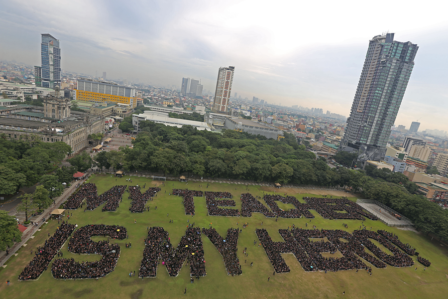 Students from the University of Santo Tomas attempt to break the world record for the 