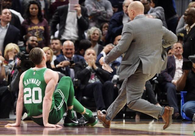 Boston Celtics forward Gordon Hayward (20) sits on the court after injuring his ankle during the first half against the Cleveland Cavaliers at Quicken Loans Arena. Mandatory Credit: Ken Blaze-USA TODAY Sports