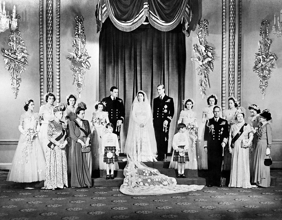 The members of the royal family pose around the Princess Elizabeth and Philip, the Duke of Edinburgh on their wedding day, November 20, 1947 in the Throne Room at Buckingham Palace. AFP