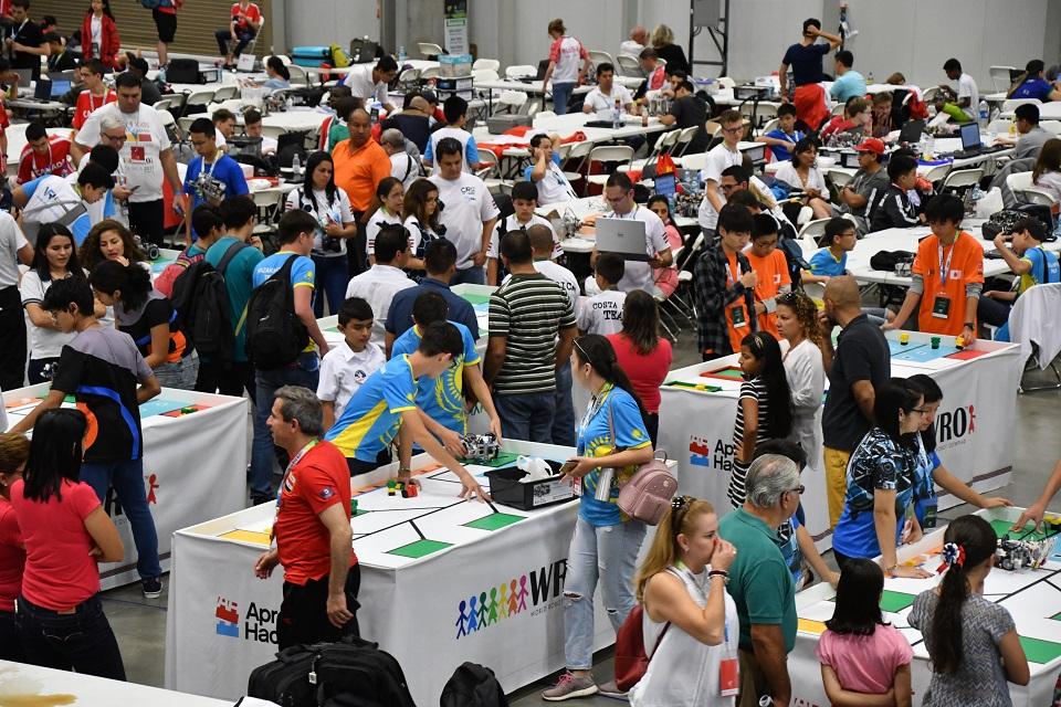 Participants from around the world take part in the World Robotics Olympiad with their miniature robots at a convention center in San Rafael, Alajuela, 22 km west of Costa Rica on November 10, 2017. This year's edition is the first taking place in Latin America. Ezequiel Becerra/AFP