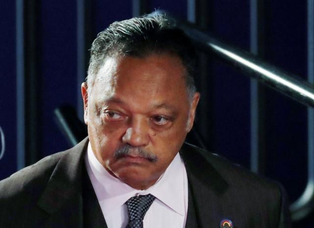 Rev. Jesse Jackson arrives at the start of the second US presidential town hall debate at Washington University in St. Louis, Missouri, U.S., October 9, 2016. REUTERS/Aaron P. Bernstein/File Photo