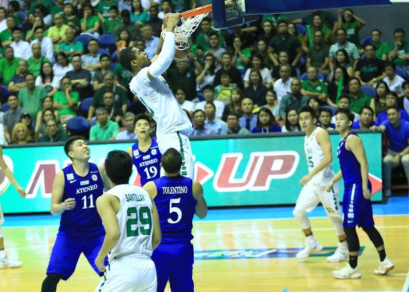 Two-time MVP Ben Mbala dunks against Ateneo. KC Cruz