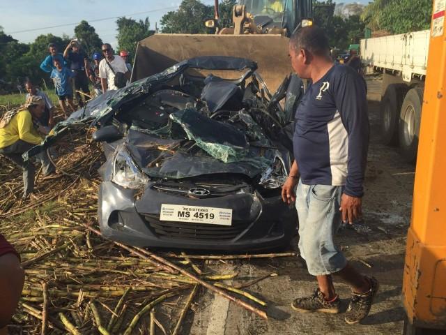 Four members of a family died after a truck filled with sugar cane hit the vehicle while traversing the national highway Bago City, Negros Occidental. PHOTO BY ANN SORILLA
