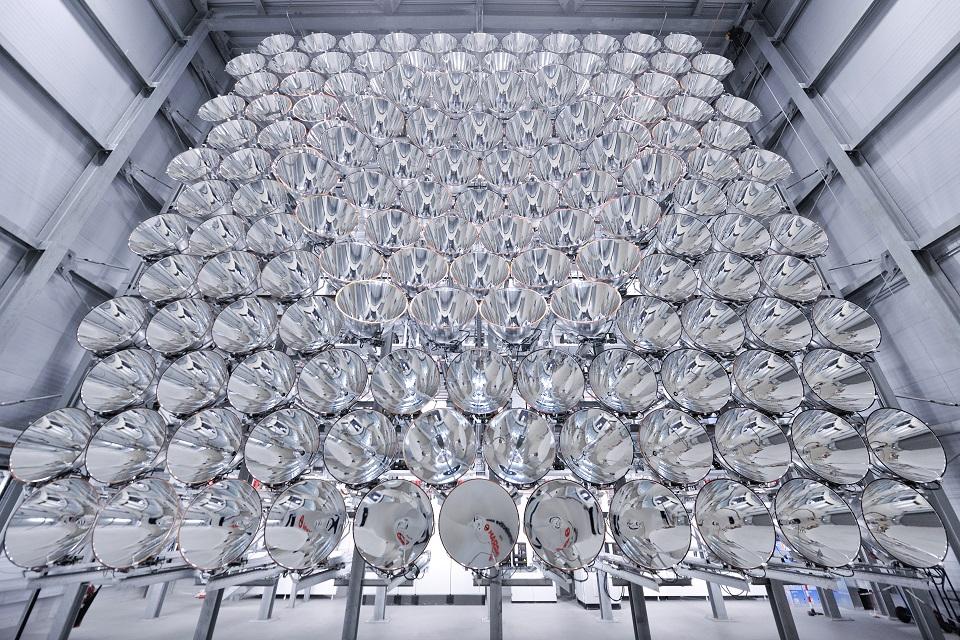 Synlight consists of a total of 149 high-power light sources, each of which is a seven-kilowatt xenon short-art lamp, as used in cinema projectors. Each source can be individually controlled, which allows various configurations and temperatures in the focal point--even in three simultaneous experiments. Photo: Markus Hauschild/DLR