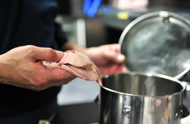 In a picture taken on June 5, 2012, Japanese chef Shigekazu Suzuki shows the liver of a pufferfish, known as fugu in Japan, which contains neurotoxin at his restaurant Torafugu-tei in Tokyo. Every year in Japan people end up in hospital after eating pufferfish, sometimes they die. Yoshikazu Tsuno/AFP