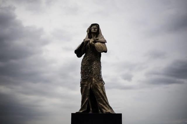 A memorial statue for World War II comfort women who were made sex slaves for Japanese troops during the conflict, stands in Manila on January 11, 2018. Months later, it was suddenly removed, supposedly for a drainage project, but the Japanese government had objected to its presence. Noel Celis/AFP