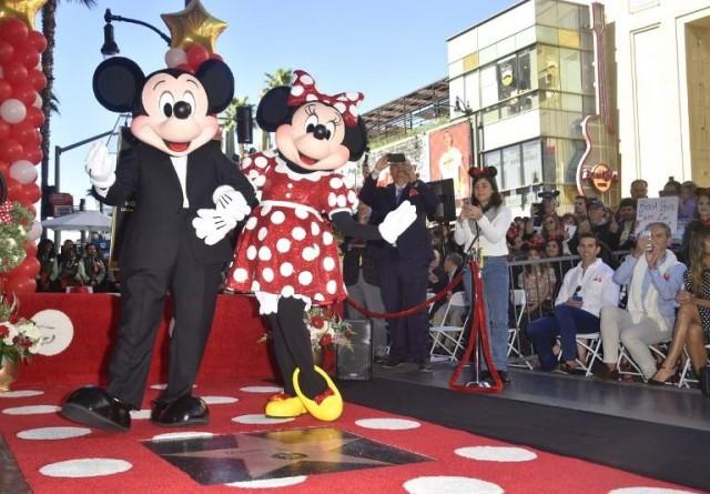 Minnie Mouse poses with Mickey while being honored with the 2,627th star on the Hollywood Walk of Fame on January 22, 2018 in Hollywood, California. AFP