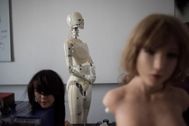 This photo taken on February 1, 2018 shows robots in a lab of a doll factory of EXDOLL, a firm based in the northeastern Chinese port city of Dalian. AFP