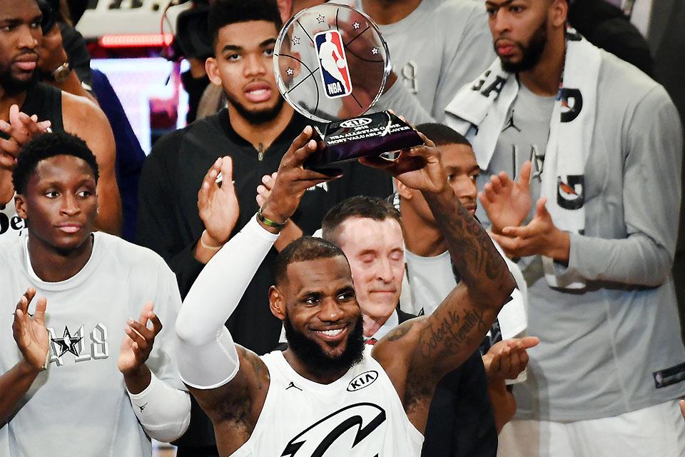 LeBron James of the Cleveland Cavaliers (23) celebrates with the trophy for most valuable player after Team LeBron won the 2018 NBA All Star game against Team Stephen at the Staples Center on Sunday, February 18, 2018. Reuters/Richard Mackson-USA TODAY Sports