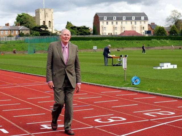 Sir Roger Bannister walks over the same finish line at the Iffley Road running track in Oxford that he crossed fifty years ago when he was the first man to run the sub-four-minute mile, May 6, 2004. REUTERS/David Bebber/File Photo