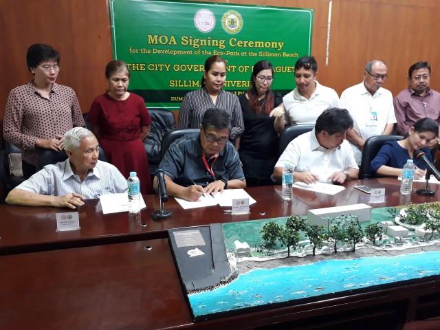 Signing the Eco-Park MOA are from (L-R), former SU president and National Scientist Dr. Angel Alcala, SU president Dr. Ben S. Malayang III, Dumaguete City Mayor Felipe Remollo, and City Tourism Officer Jacky Antonio PHOTO BY RAFFY CABRISTANTE
