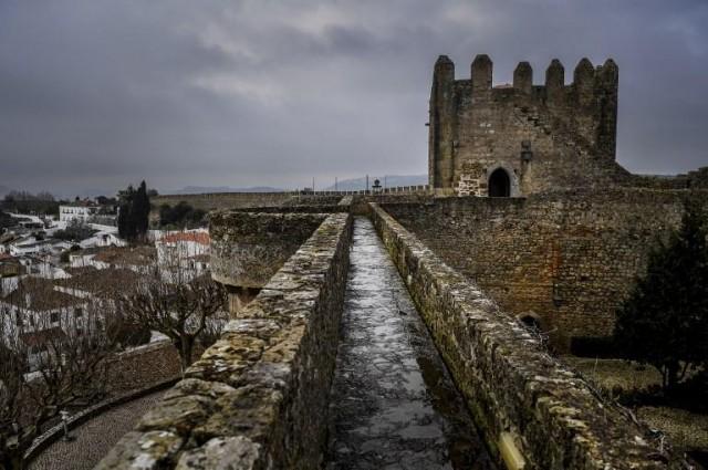 Picture shows the castle's tower and walls attached to the 'Pousada do Castelo' inn located in the medieval town of Obidos, central Portugal, on February 9, 2018. PATRICIA DE MELO MOREIRA / AFP