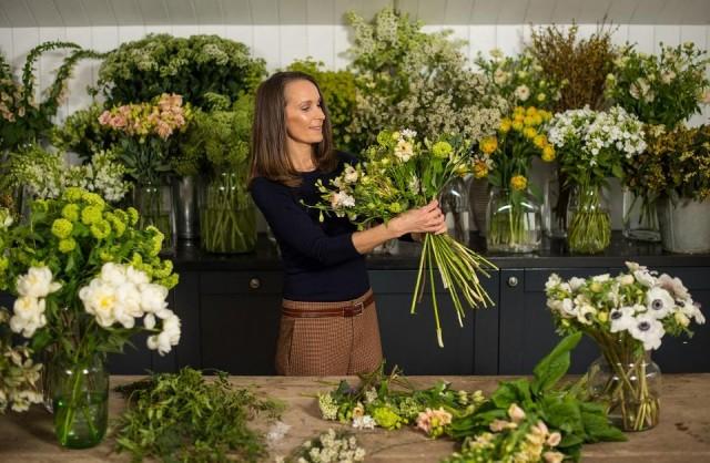 Florist Philippa Craddock arranges flowers in her studio in London on March 29, 2018. She has been chosen to create the church flowers for the wedding of Prince Harry and Meghan Markle in May. Dominic Lipinski/Pool/AFP