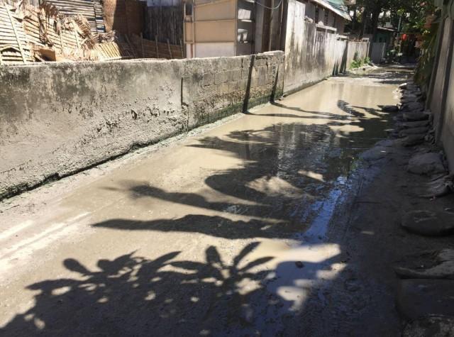 Behind white sand beaches are these muddy roads. PHOTO BY AYA TANTIANGCO