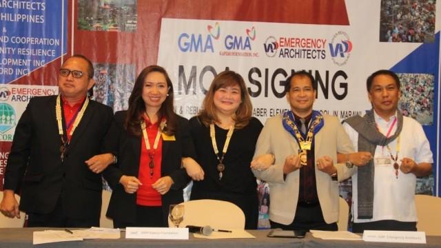 (From left) UAP-EA deputy chairperson Jose Miranda, UAP-EA chairperson Stephanie Gilles, GMAKF EVP/COO Rikki Escudero-Catibog, UAP outgoing president Guillermo Hisancha, and UAP incoming president Benjamin Panganiban sign a Memorandum of Agreement on April 14, 2018 at the SMX Convention Center to rehabilitate the Datu Saber Elementary School in Barangay Saber, Marawi City.