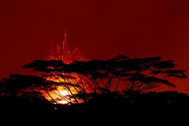 A 17th lava fissure erupts hundreds of feet in the air during a volcano outbreak in Pahoa, Hawaii, U.S., May 19, 2018. Picture taken May 19, 2018. Courtesy John Linzmeier/U.S. Air National Guard/Handout via REUTERS