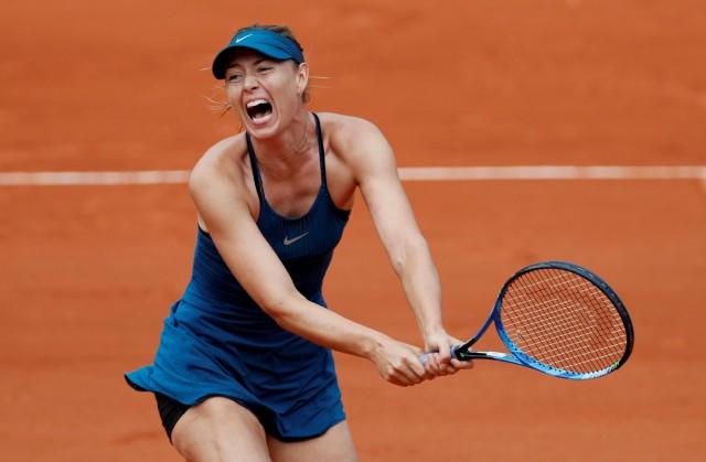 Russia's Maria Sharapova in action during her first round match against Netherlands' Richel Hogenkamp REUTERS/Gonzalo Fuentes