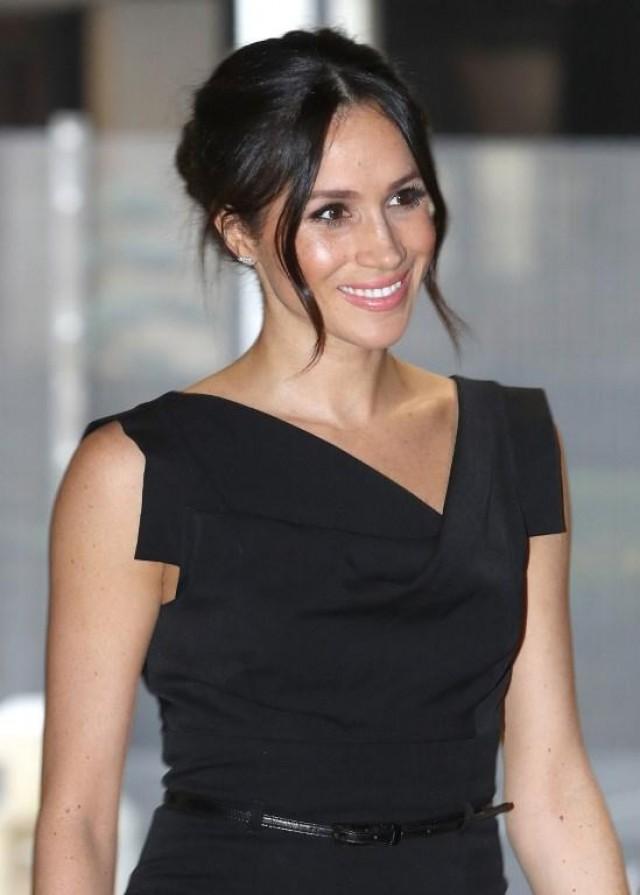 In this file photo taken on April 19, 2018 Britain's Prince Harry's fiancee, US actress Meghan Markle, attends a reception for Women's Empowerment at the Royal Aeronautical Society in central London, on the fourth day of the Commonwealth Heads of Government Meeting CHRIS JACKSON / POOL / AFP