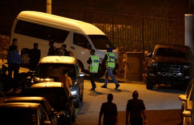 Police arrive at former prime minister Najib Razak's residence in Kuala Lumpur, Malaysia May 16, 2018. REUTERS/Lai Seng Sin