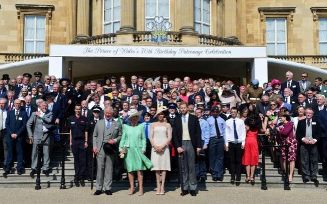 Prince Harry and his wife Meghan, Duchess of Sussex, at a garden party at Buckingham Palace with Prince Charles and Camilla the Duchess of Cornwall, their first royal engagement as a married couple, in London, May 22, 2018. Dominic Lipinski/Pool via Reuters