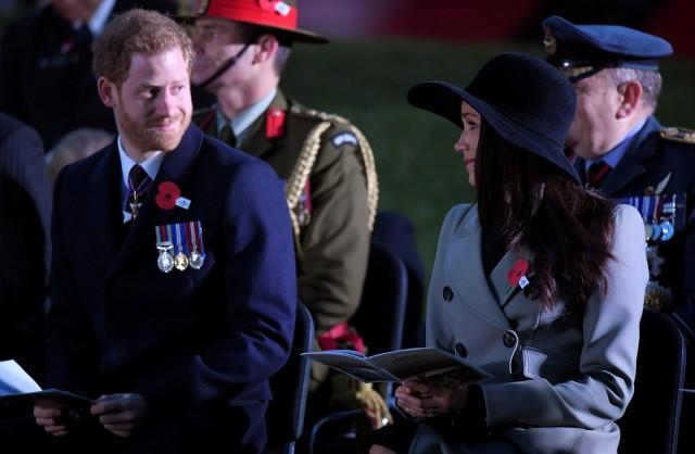 Britain's Prince Harry and his fiancee Meghan Markle attend the Dawn Service at Wellington Arch to commemorate Anzac Day in London, Britain, April 25, 2018. REUTERS/Toby Melville/Pool