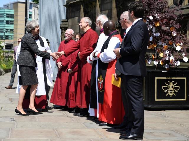Britain's Prime Minister Theresa May arrives to attend The Manchester Arena National Service of Commemoration at Manchester Cathedral in central Manchester, Britain May 22, 2018. Paul Ellis/Pool via Reuters