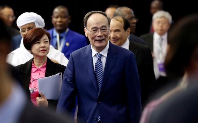 Chinese Vice President Wang Qishan attends the opening ceremony of a forum on China-Africa local government cooperation, in Beijing, China May 8, 2018. Picture taken May 8, 2018. China Daily via REUTERS