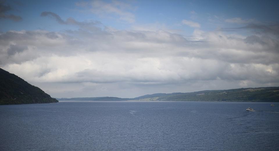 Tourists take in the sights as they travel by cruise boat on Loch Ness in the Scottish Highlands, Scotland on June 10, 2018. Andy Buchanan/AFP