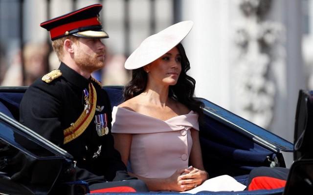 Britain's Prince Harry and Meghan, Duchess of Sussex, take part in the Trooping the Colour parade in central London, Britain, June 9, 2018. REUTERS/Peter Nicholls