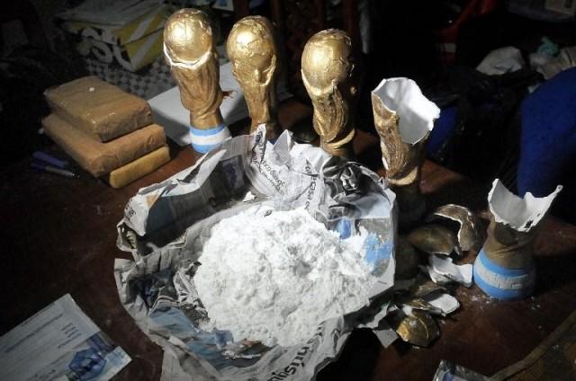 Handout picture released by the Buenos Aires Province Security Ministry showing seized replicas of FIFA World Cup trophies used to hide cocaine in La Matanza, Buenos Aires Province, Argentina, on June 22, 2018. HO / BUENOS AIRES PROVINCE SECURITY MINISTRY / AFP
