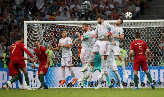 World Cup - Group B - Portugal vs Spain - Fisht Stadium, Sochi, Russia - June 15, 2018 Portugal's Cristiano Ronaldo scores their third goal REUTERS/Murad Sezer