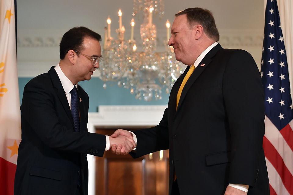 US Secretary of State Mike Pompeo greets Foreign Affairs Secretary Alan Peter Cayetano (left) prior to their meeting on Thursday, June 21, 2018 at the State Department in Washington, DC. AFP/Nicholas Kamm 