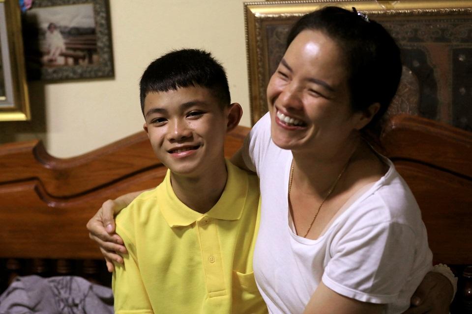 Duangpetch Promthep and his aunt Thanaporn Promthep, whom he calls mother, smile during an interview at their home, in Mae Sai, the northern province of Chiang Rai, Thailand, July 19, 2018. REUTERS/Soe Zeya Tun