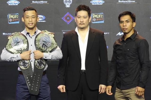 Chatri Sityodtong stands between Martin Nguyen (L) and Kevin Belingon (R) photo by ONE CHAMPIONSHIP