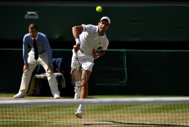 All England Lawn Tennis and Croquet Club, London, Britain - July 11, 2018 Serbia's Novak Djokovic in action during his quarter final match against Japan's Kei Nishikori REUTERS/Tony O'Brien