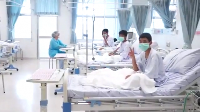 A handout video screen grab released by the Thai Government Public Relations Department shows the members of the Wild Boars football team who were rescued from a flooded Tham Luang cave as they rest in a hospital in Chiang Rai, Thailand on Wednesday, July 11, 2018. PRD via Reuters 