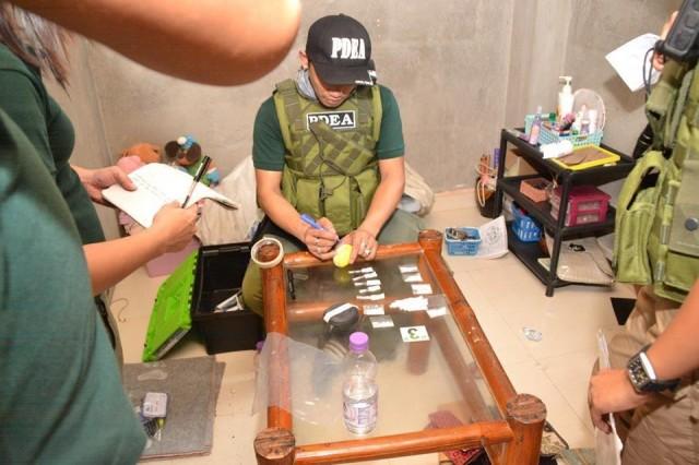The implementation of five search warrants in Barangay San Juan, Baao town in Camarines Sur was led by the PDEA Camarines Sur Provincial Office resulted in the arrest of 9 people and confiscation of P1-million worth of suspected shabu. PHOTO BY PDEA CAMARINES SUR 