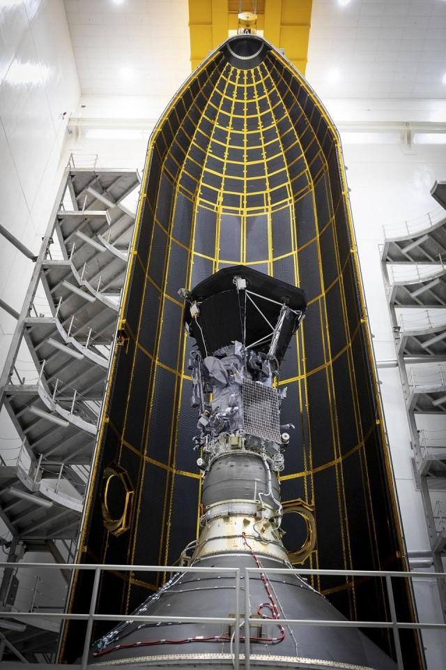 This NASA photo obtained August 1, 2018 shows one half of a 62.7-foot tall fairing as the Parker Solar Probe is encapsulated on July 16, 2018, in preparation for the move from Astrotech Space Operations in Titusville, Florida, to Space Launch Complex 37 on Cape Canaveral Air Force Station, where it will be integrated onto its launch vehicle for its launch that is targeted for August 11, 2018. HO/NASA/AFP