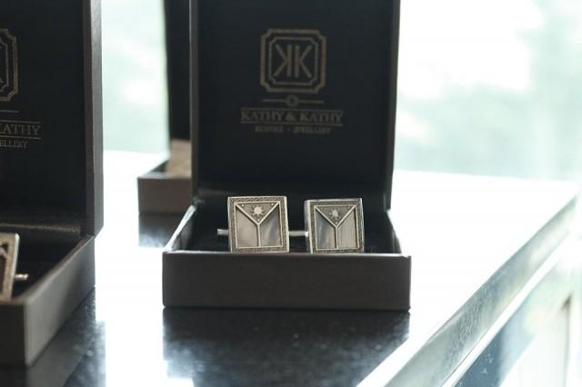 Silver and mother of pearl cufflinks designed by Kathy & Kathy. Photo: Aya Tantiangco / GMA News.