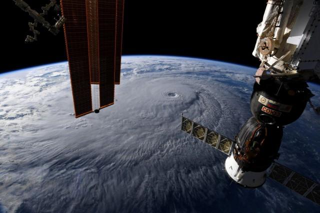 A photo taken from the International Space Station and moved on social media by astronaut Ricky Arnold shows Hurricane Lane in the early morning hours near Hawaii, U.S., August 22, 2018. Courtesy @astro_ricky/NASA/Handout via REUTERS