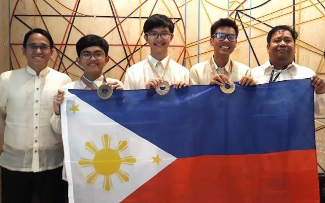 The award-winning Philippine team. From left: Professor Ian Vega, Mikhail Torio, Steven Reyes, Charles Bartolo, and Professor Perry Esguerra. Photo: Philippine IPhO team