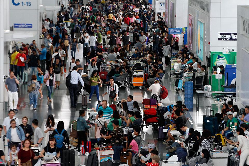 International and domestic air passengers wait at the departure lounge of the Ninoy Aquino International Airport Terminal 3 in Para&Atilde;&plusmn;aque City on Friday, August 17, 2018 due to delays in several flights after a Xiamen Airlines jetliner runway incident. Danny Pata 