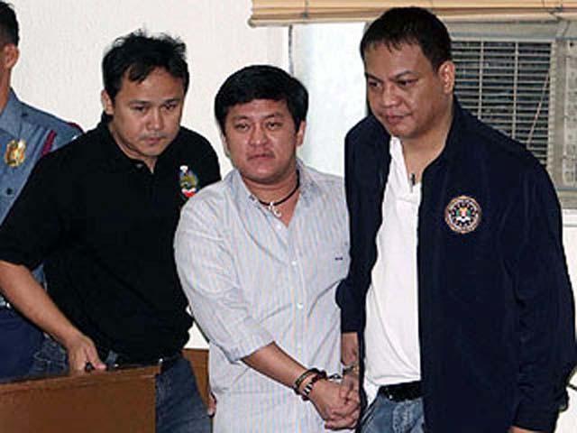 Massacre suspect Andal Ampatuan Jr. enters the trial venue at Camp Crame in this file photo for the multiple murder case against him. GMANews.TV