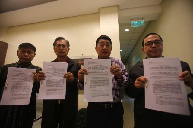 Labor Undersecretary Jing Paras (third from left) along with lawyers Nasser Marohomsalic, Alvaro Lazaro and Eligio Mallari file a sedition case against Senator Antonio Trillanes. Danny Pata