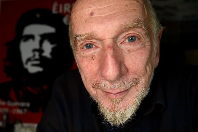 Artist Jim Fitzpatrick who has created an Irish postage stamp using the poster of Che Guevara he created in 1968 entitled 'Viva Che!' based on a photograph by Alberto Korda poses for a picture at his studio in Dublin, Ireland October 11, 2017. REUTERS/Clodagh Kilcoyne/File Photo