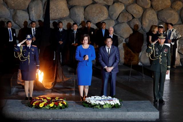 President Rodrigo Duterte and his daughter Sara Duterte-Carpio attend a ceremony commemorating the six million Jews killed by the Nazis during the Holocaust, in the Hall of Remembrance at Yad Vashem World Holocaust Remembrance Center in Jerusalem September 3, 2018. REUTERS/Ronen Zvulun