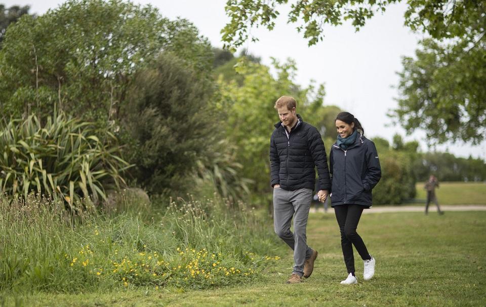 Prince Harry and his wife Meghan, Duchess of Sussex visit Totaranui Campground in the Abel Tasman National Park on October 29, 2018. Prince Harry passed on greetings from "our little bump" to conservation workers. Robert Kitchin/Pool/AFP