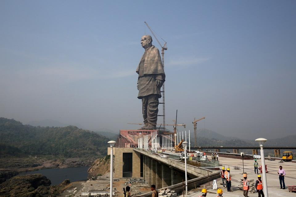 Labourers work at the under construction site of the "Statue of Unity" portraying Sardar Vallabhbhai Patel, one of the founding fathers of India, during a media tour in Kavadia, in the western state of Gujarat, India, October 18, 2018. Picture taken October 18, 2018. REUTERS/Amit Dave