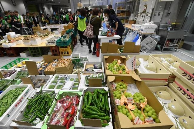 Fruit and vegetables are on display in front of a brokage shop at the new Toyosu fish market, the first day of the market's opening in Tokyo on October 11, 2018. Toshifumi Kitamura/AFP