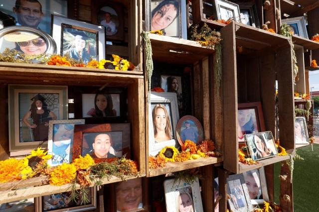 Photos of the 58 victims of the October 1, 2017 mass shooting are displayed during the one-year anniversary of the October 1 mass shooting in Las Vegas, Nevada, U.S. October 1, 2018. REUTERS/Steve Marcus